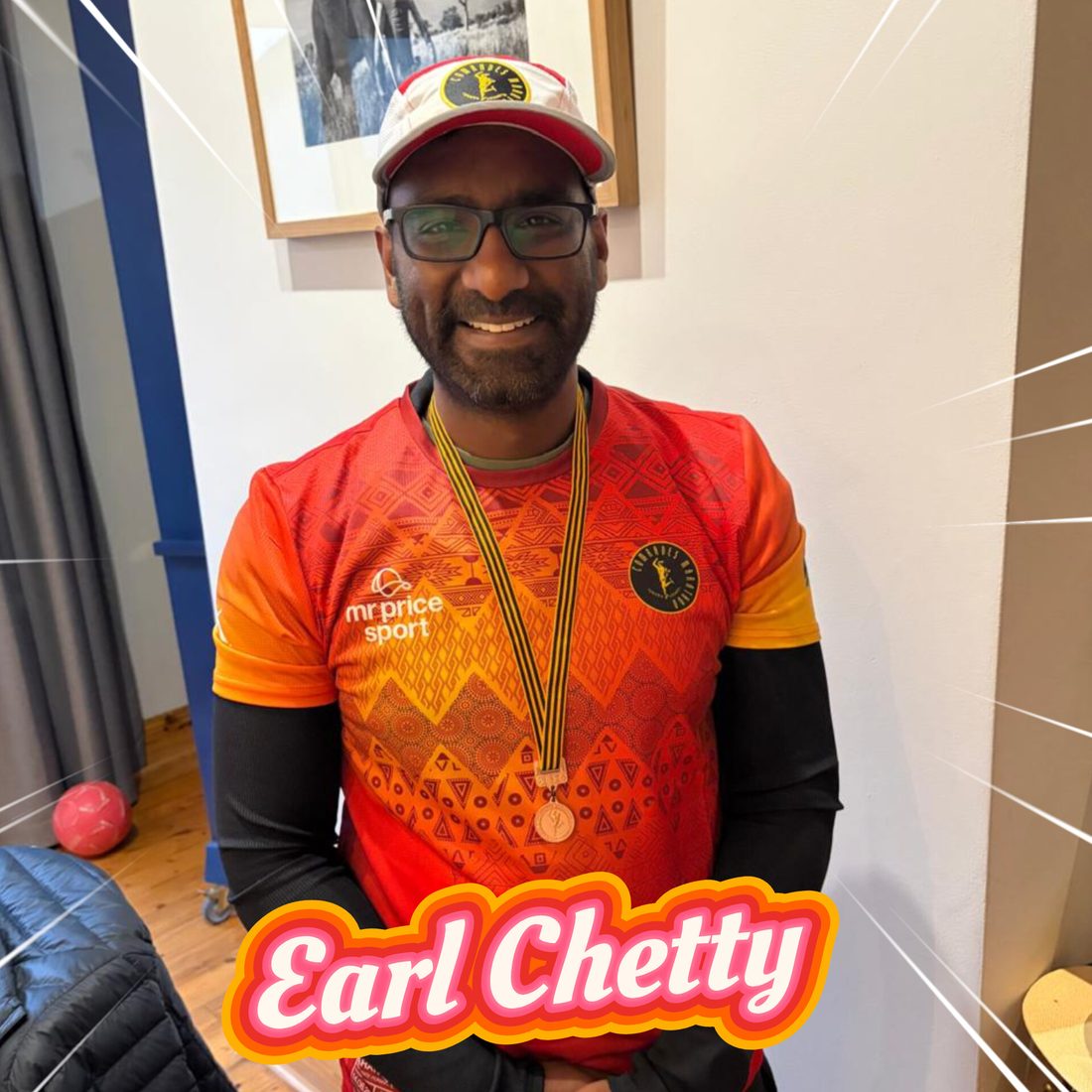 Earl Chetty with his Comrades Marathon medal